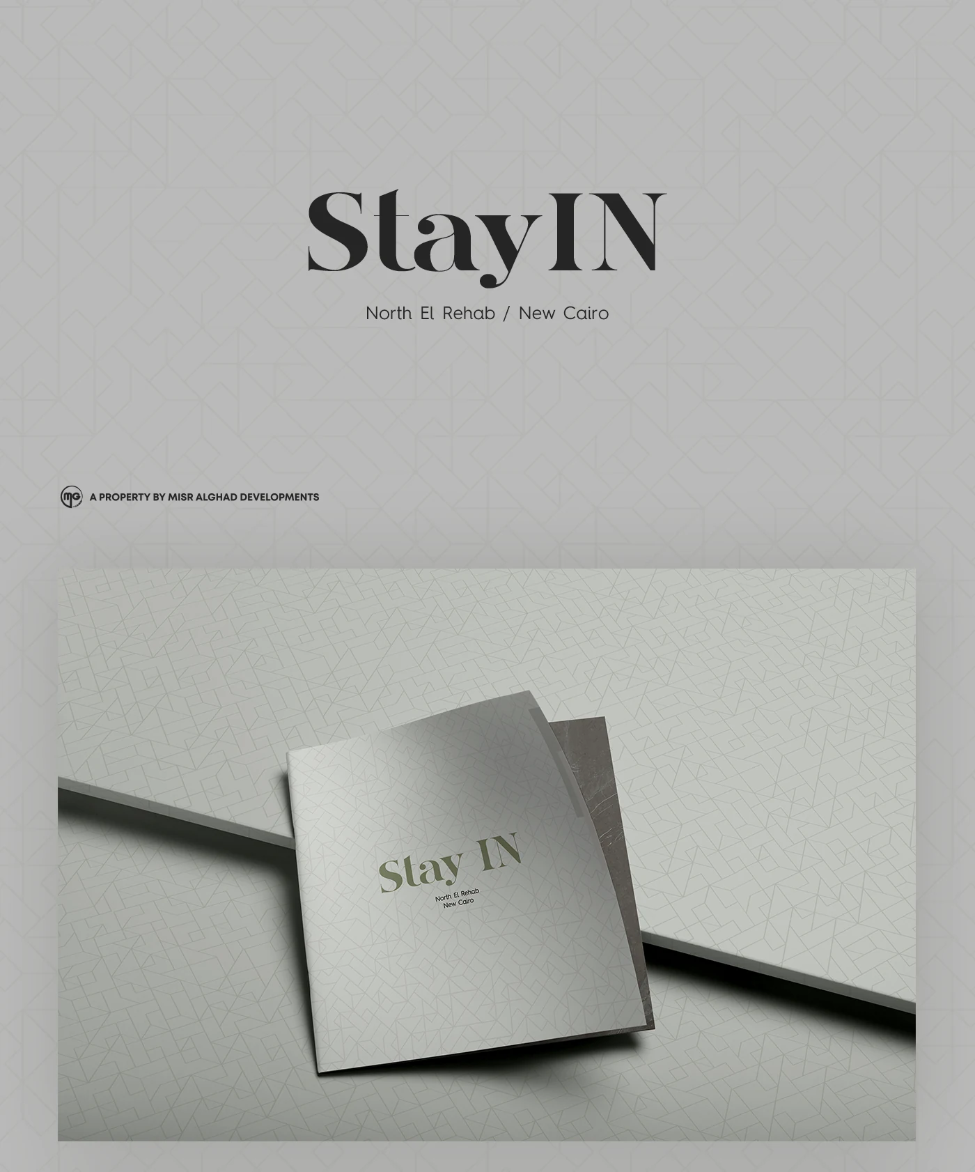 Stay IN real estate brochure cover and printed mockup for Misr Al Ghad Developments